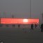 Plaza Tiananmen, televisando el atardecer. La contaminación no permite ver el sol.